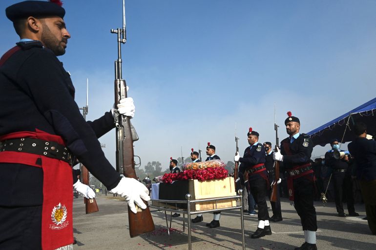 Policemen pay tribute to officer during the funeral ceremony in Islamabad