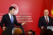 North Macedonia&#39;s Prime Minister Dimitar Kovacevski (R) and Bulgarian Prime Minister Kiril Petkov speak to journalists in the government building in Skopje, on January 18, 2022 [Robert Atanasovski/AFP]