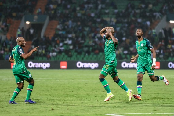 Comoros' forward Ahmed Mogni (C) celebrates after scoring his team's third goal during the Group C Africa Cup of Nations (CAN) 2021 football match between Ghana and Comoros at Stade Roumde Adjia in Garoua on January 18, 2022. (Photo by Daniel BELOUMOU OLOMO / AFP)