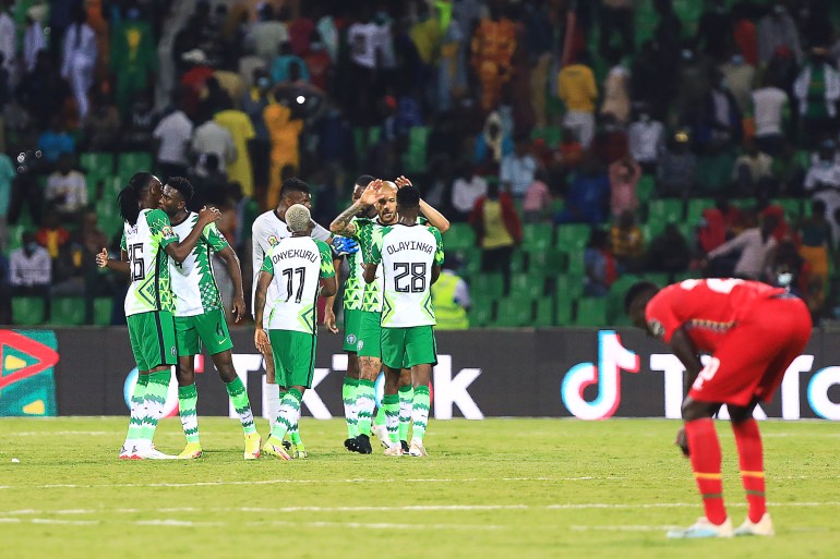 Nigeria's players celebrate after winning the Group D match against Guinea-Bissau
