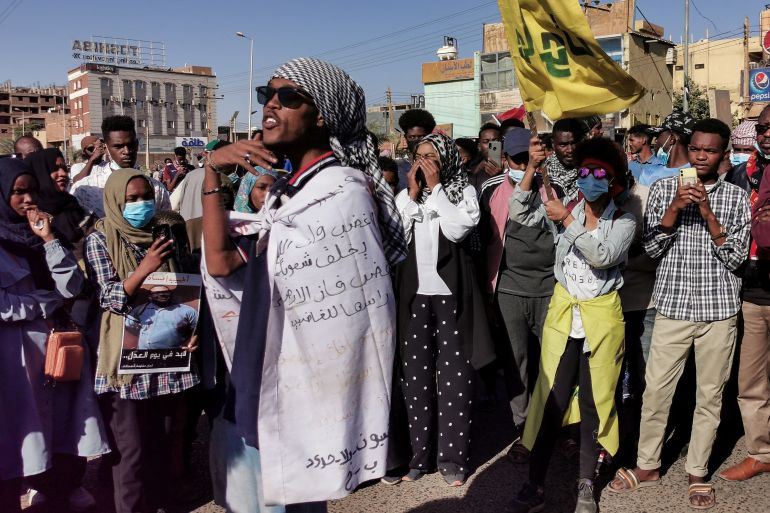 Young women and men take to the streets of the Sudanese capital Khartoum, to protest