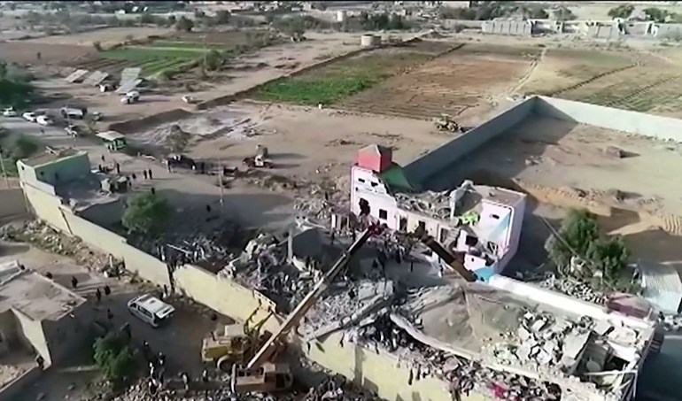 An aerial shot shows the destruction of a prison in Yemeni city of Saada