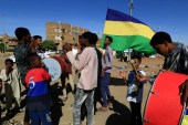Sudanese youths beat drums and chant slogans as they tour neighbourhoods in the capital Khartoum, in support of the families of protesters killed since last year&#39;s military coup [AFP]
