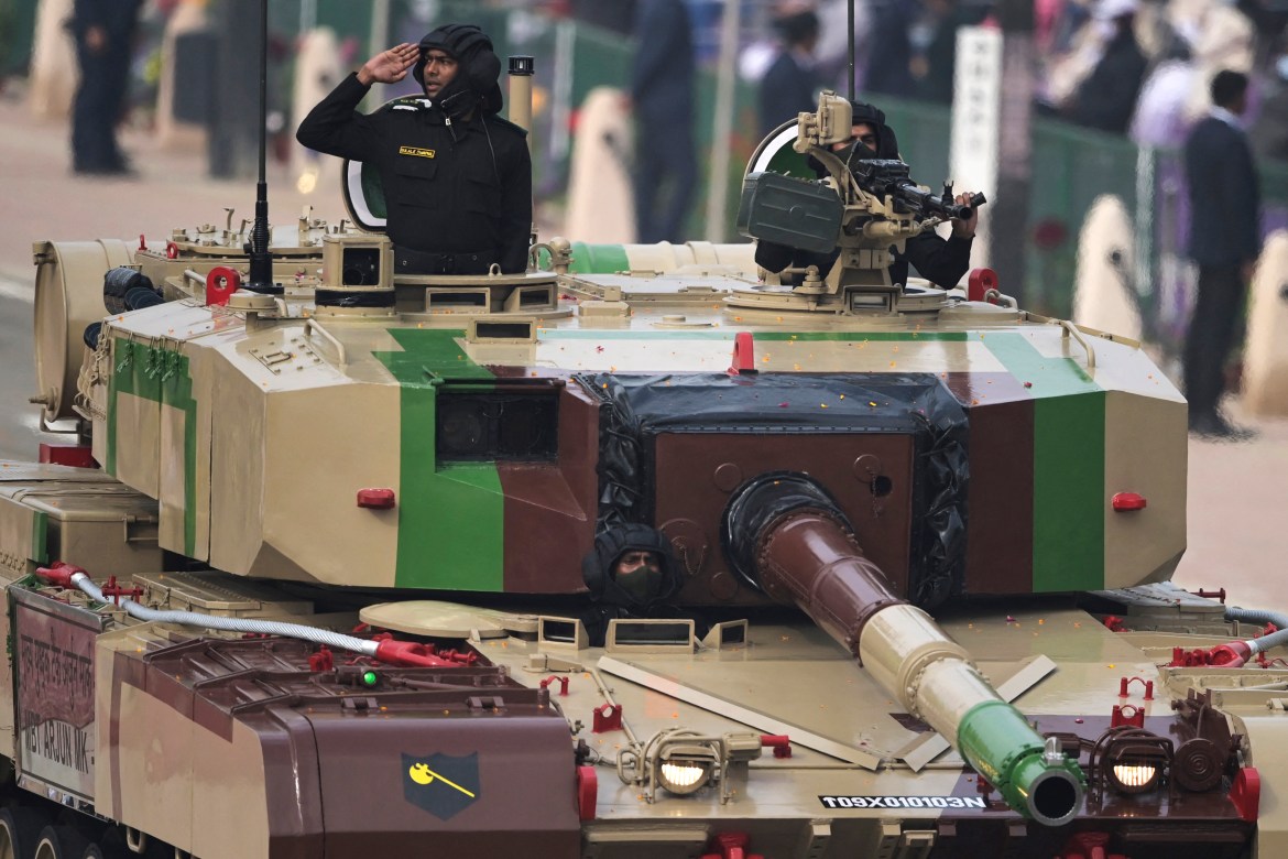 An officer salutes atop an Arjun Tank during India's Republic Day parade in New Delhi