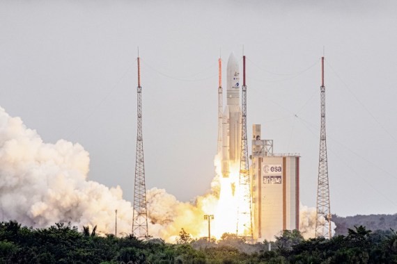 Arianespace's Ariane 5 rocket lifting up from the launchpad