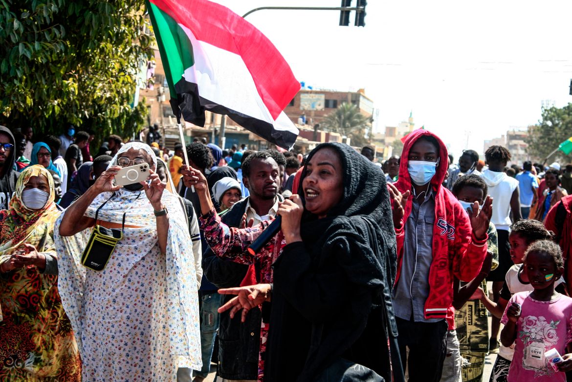 A Sudanese woman speaks during in a rally to protest against last year's military coup, in the capital Khartoum, on January 30, 2022.