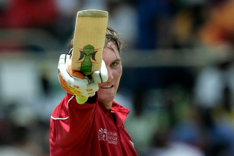 Zimbabwe's Brendan Taylor raises his bat after scoring 50 runs against West Indies during their World Cup cricket match in Kingston March 19, 2007. MOBILES OUT, EDITORIAL USE ONLY REUTERS/Andy Clark (JAMAICA)