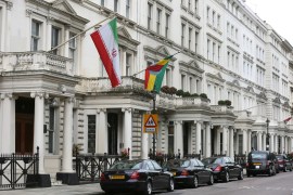 The Iranian flag is seen hanging outside from the building of the Iranian embassy in London, UK
