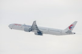 A China Eastern Boeing 777-300 ER in the air shortly after take off from Chicago