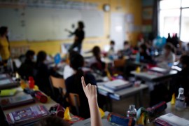 Schoolchildren attend a lesson in their classroom at a private school in Saint-Sebastien-sur-Loire, France