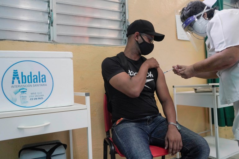 A man receives a dose of the Abdala vaccine at a vaccination center amid concerns about the spread of the coronavirus disease (COVID-19), in Havana, Cuba,