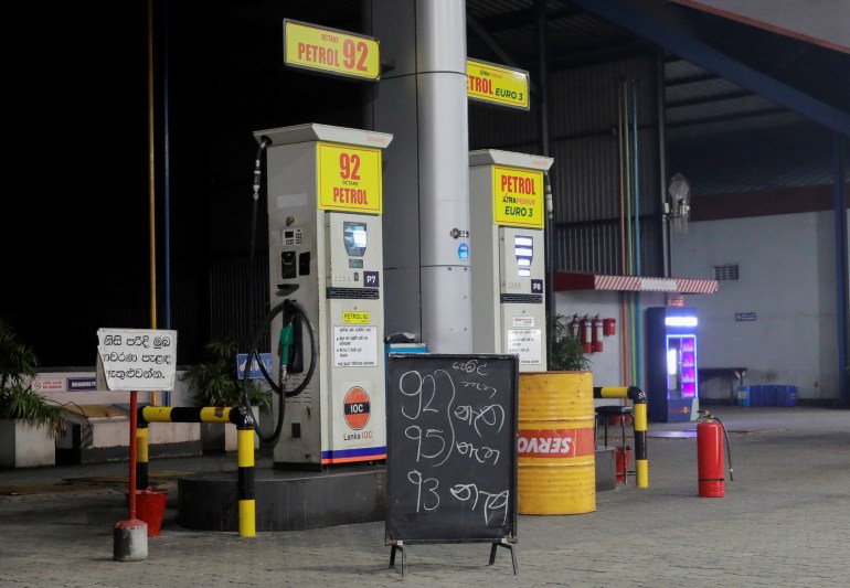 A sign board shows unavailability of 92,95 and 93 octane fuel at a fuel station in Colombo, Sri Lanka