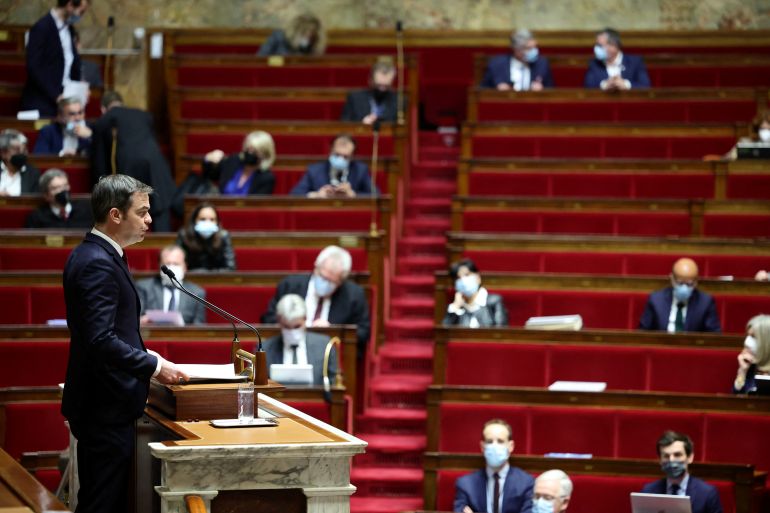 French Health Minister Olivier Veran delivers a speech during the opening debate on the French government's planned bill to transform the current health pass into a vaccine pass