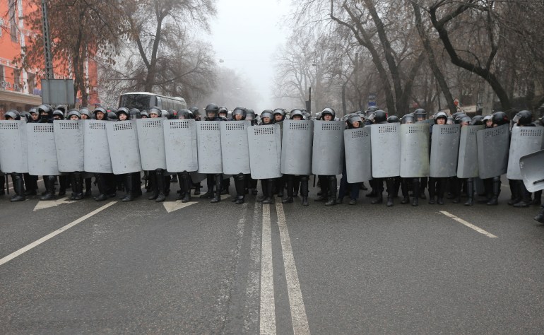 Kazakh law enforcement officers during a protest triggered by fuel price increase in Almaty, Kazakhstan