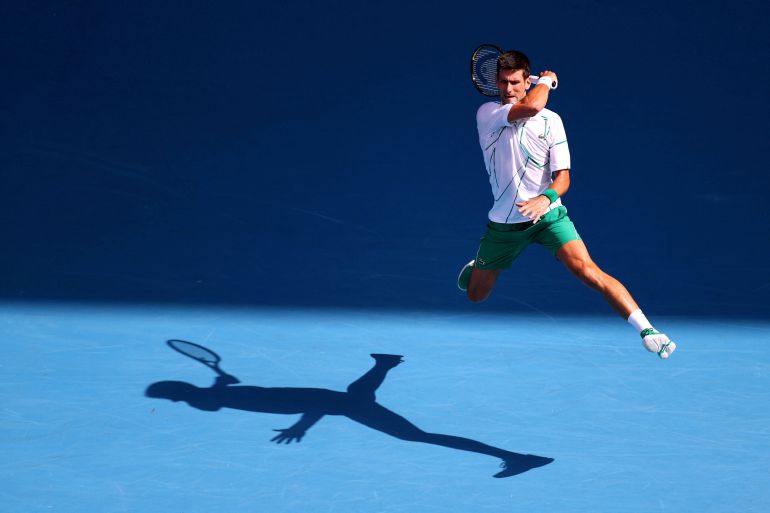 Novak Djokovic playing tennis in Melbourne Park