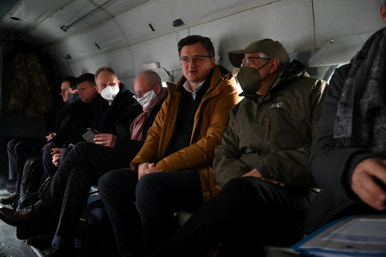 High Representative of the European Union for Foreign Affairs Josep Borrell and Ukrainian Foreign Minister Dmytro Kuleba sit inside a helicopter during their flight to Luhansk Region, Ukraine