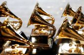 Nominations for the 2022 Grammys were announced in November, with pianist and bandleader Jon Batiste leading the field of nominees [File: Carlo Allegri/Reuters]