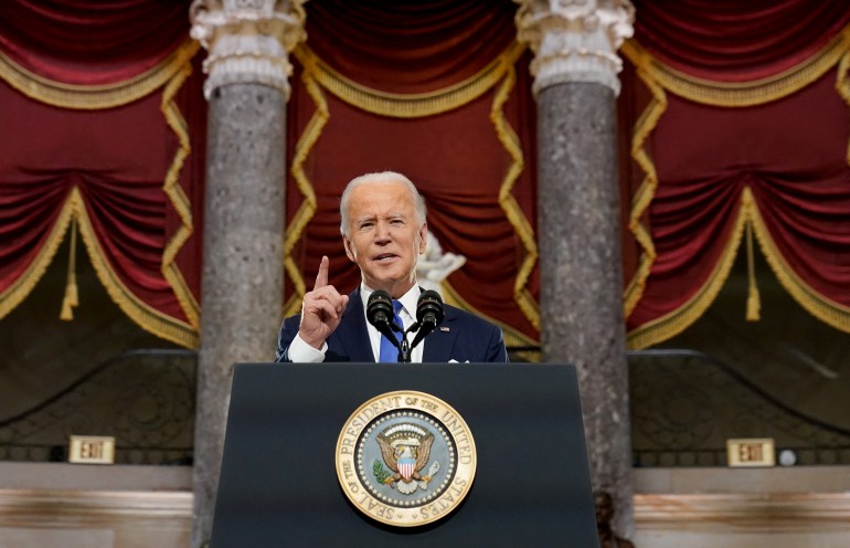 U.S. President Joe Biden speaks in Statuary Hall on the first anniversary of the January 6, 2021 attack on the U.S. Capitol