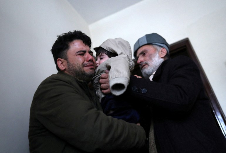 An Afghan child who went missing in a US plane crash has been reunited with his family