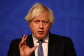 FILE PHOTO: British Prime Minister Boris Johnson holds a news conference for the latest coronavirus disease (COVID-19) update in the Downing Street briefing room, in London, Britain December 8, 2021. Adrian Dennis/Pool via REUTERS/File Photo (Reuters)