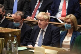 British Prime Minister Boris Johnson is seen sitting in the United Kingdom's Parliament.