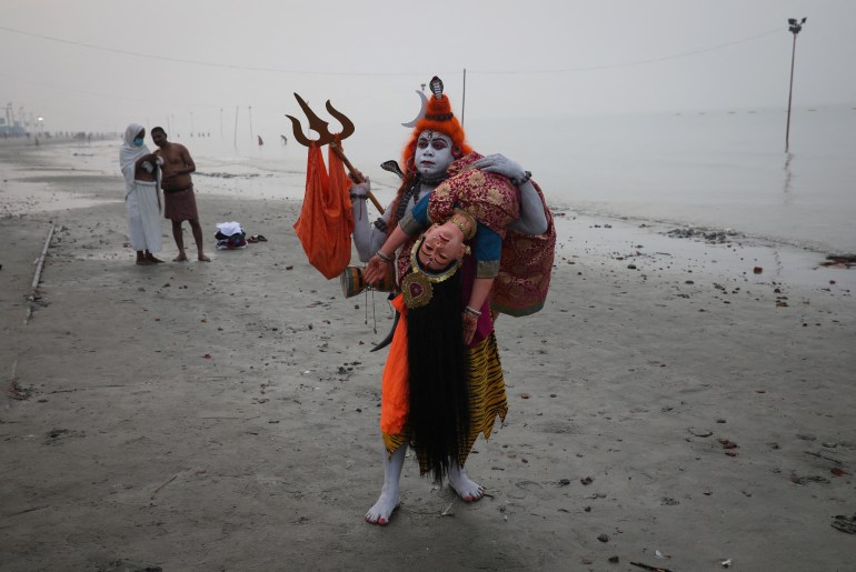 A man dressed as Hindu Lord Shiva