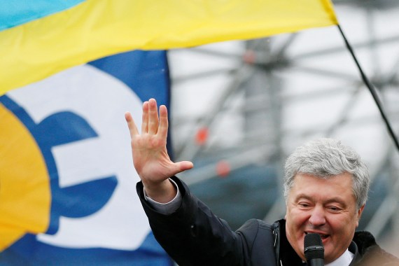 Ukraine's former President Petro Poroshenko addresses his supporters at Zhulyany airport in Kyiv, Ukraine