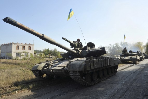 Tanks of the Ukrainian armed forces are parked on the roadside during a withdrawal near the village of Nyzhnje in Luhansk region, Ukraine,
