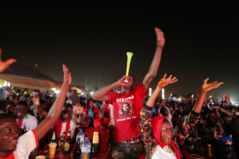 Burkina Faso fans celebrate after winning the Africa Cup of Nations 2021 quarter-final football match between Burkina Faso and Tunisia in Ouagadougou, Burkina Faso, January 29, 2022. REUTERS/Zohra Bensemra