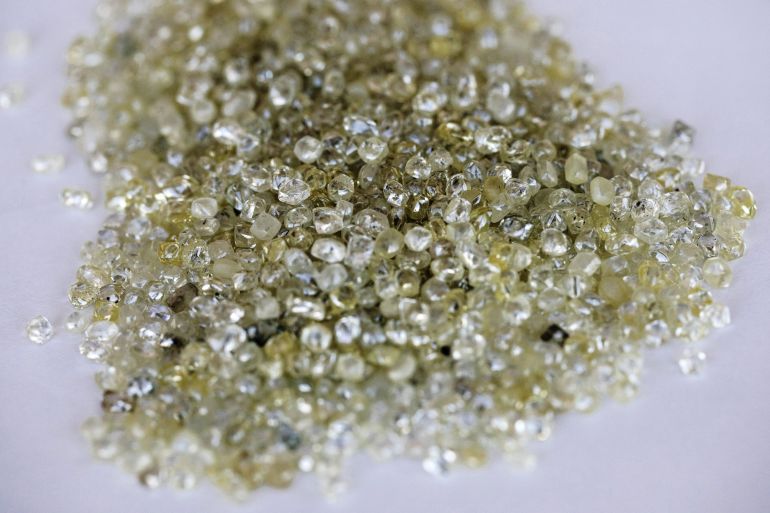 Rough diamonds sit on a sorting table at the Namibian Diamond Trading Co.