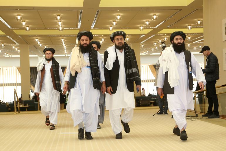 Afghanistan's Taliban delegation arrive for the agreement signing between Taliban and US