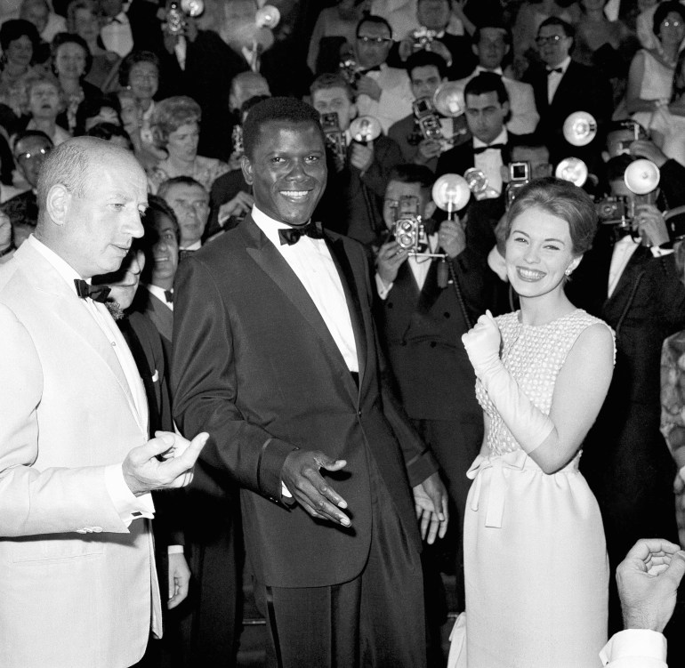 Black and white photo of Sidney Poitier at the Cannes film festival