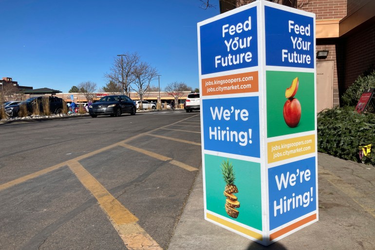 A hiring sign stands outside a King Soopers grocery store in southeast Denver, Colorado, US