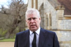 Prince Andrew stand outside the chapel at Royal Lodge in Windsor England