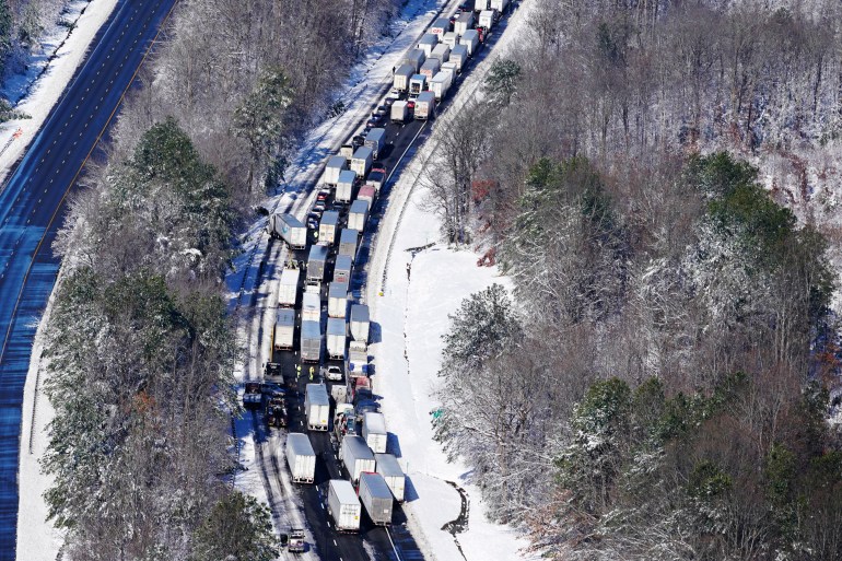 A row of cars waiting for traffic to clear on Interstate 95 in Virginia