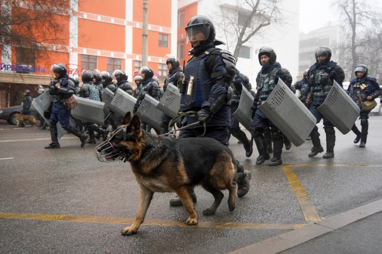 Kazakh law enforcement officers during a protest triggered by fuel price increase in Almaty, Kazakhstan