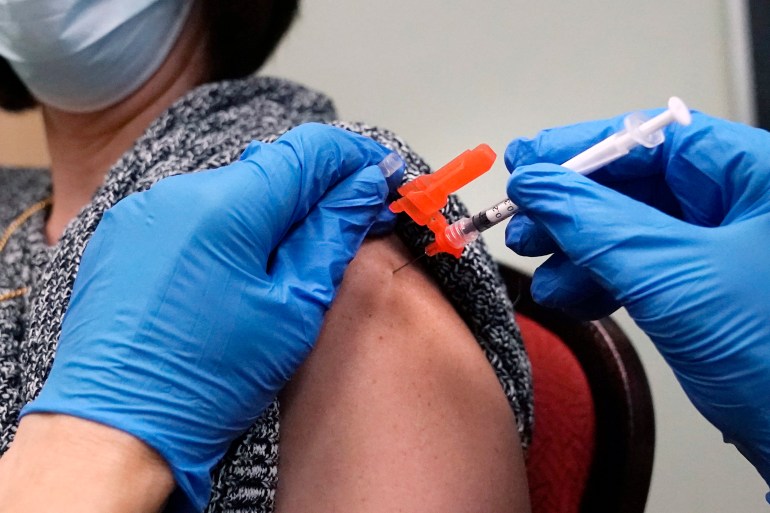 Person getting vaccine shot