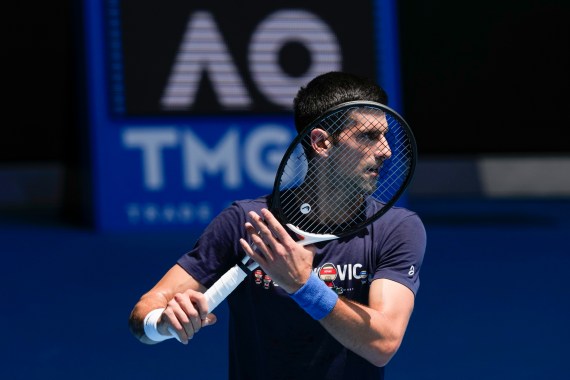 Defending men's champion Serbia's Novak Djokovic practices