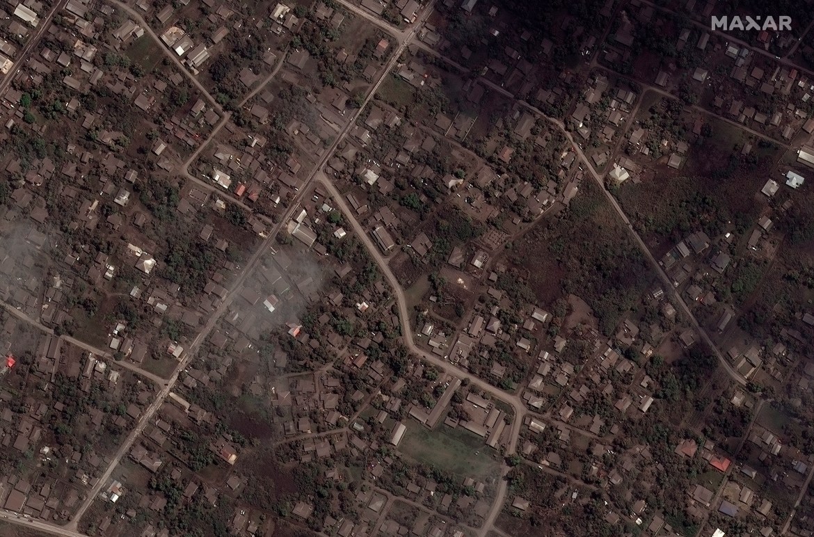 Ash covered homes and buildings in Tonga Tuesday, January 18, 2022