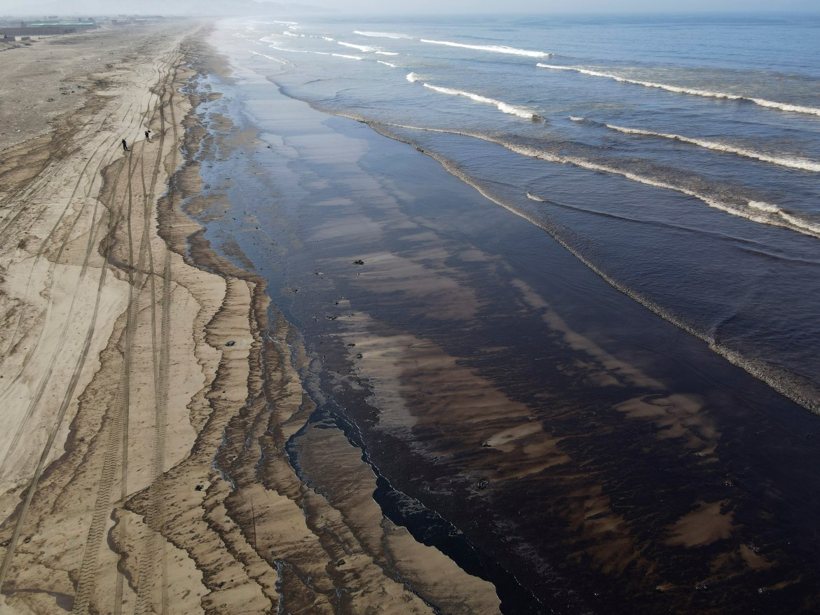 Oil pollutes Cavero beach in Ventanilla, Callao, Peru