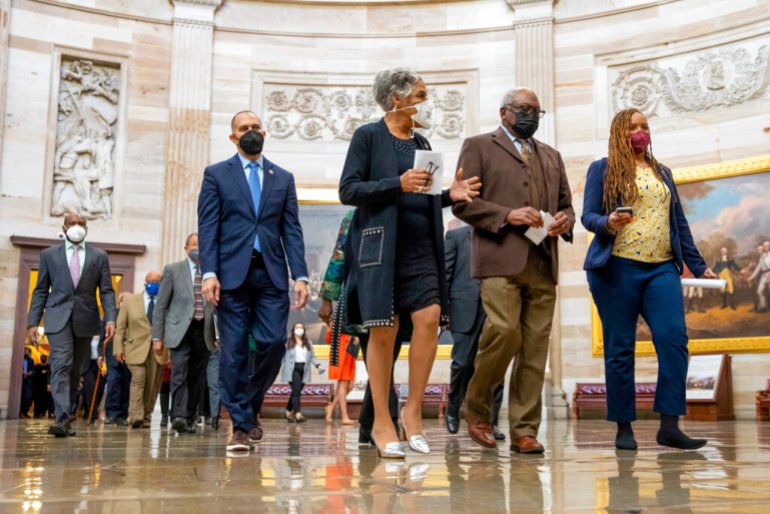 Rep.  Hakeem Jeffries, DN.Y., Rep.  Joyce Beatty, D-Ohio, and House Majority Whip Jim Clyburn, DS.C., and other members of the Congressional Black Caucus, walk to the Senate chamber to speak to reporters about their support of voting rights legislation.