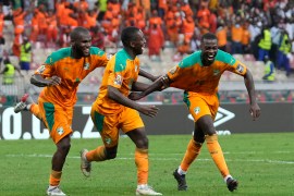 Ivory Coast's Nicolas Pepe, right, celebrates with teammates after scoring during the African Cup of Nations 2022 group E soccer match between Ivory Coast and Algeria