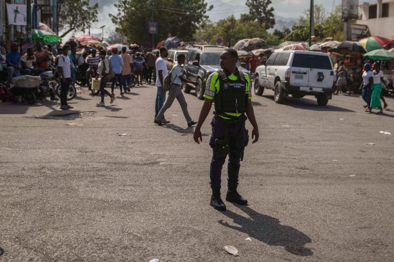 Police officer in Haiti street