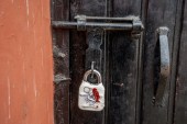 A sealed lock hangs at the gate of the closed Kashmir Press Club building in Srinagar [Dar Yasin/AP]