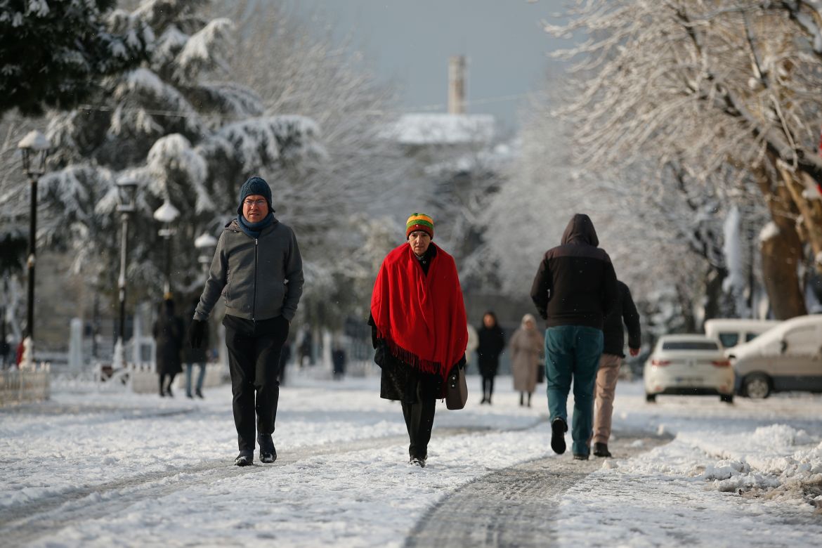 People walk in the snow at Istanbul