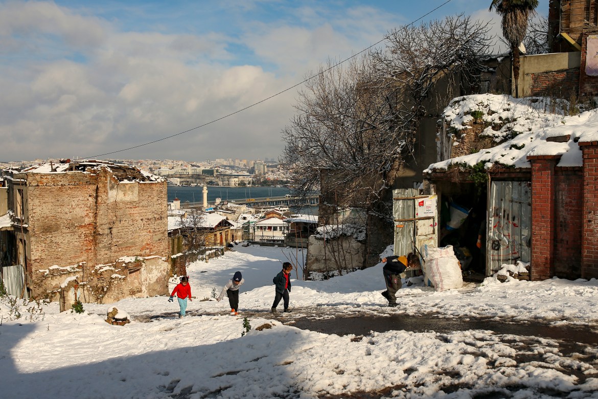 People walk in the snow at Istanbul