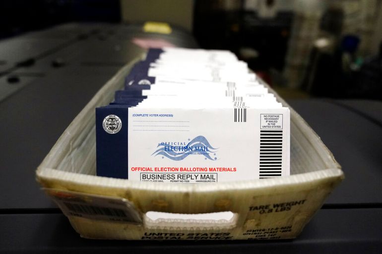 Mail-in ballots for the US 2020 election before being sorted at the Chester County Voter Services office in West Chester, Pennsylvania.