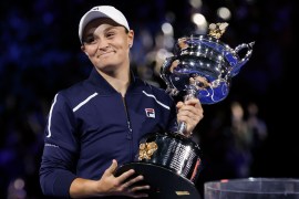 Ash Barty of Australia holds the trophy after winning the Australian Open women’s final