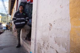 Jose Sica stands outside his shop in Quetzaltenango, Guatemala