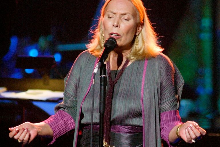 Singer Joni Mitchell performs during the Stormy Weather concert in Los Angeles